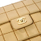 Pre-Owned Chanel Grid Stitch Classic Flap Shoulder Bag in Beige - Classic Charmers